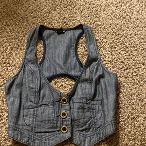 Selling a gray with black guess vest.size small.